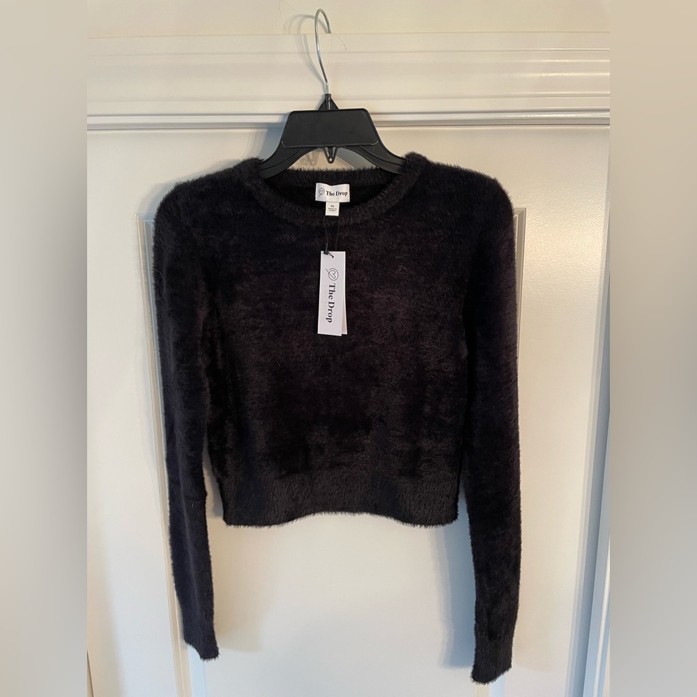 Women’s black cropped fuzzy sweater